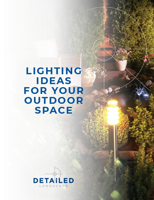 Cover image titled "Lighting Ideas for Your Outdoor Space" featuring a well-lit garden with a pathway light, potted plants, a small pond, and outdoor seating. The design includes a soft overlay of geometric lines and Detailed Landscape logo.